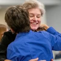 Attendees mingling prior to event start 16